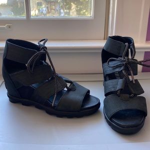 Black Sorel wedge sandals